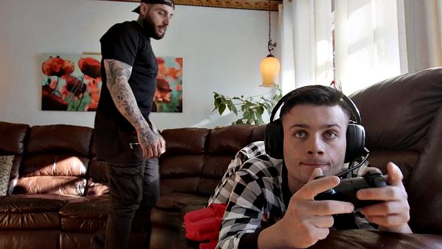 Muscled jock with tattoos barebacks gamer's asshole