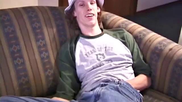 RJ Davis is a 21 year old Texas native, who wants to show the world his unique talents. Naked on the couch, he starts to rub his cock and then makes use of a purple vibrator, which he clearly enjoys.