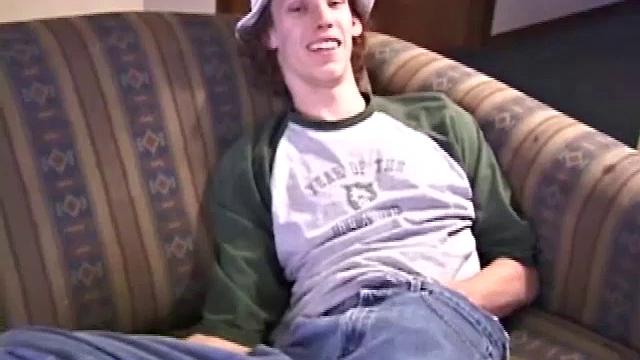 RJ Davis is a 21 year old Texas native, who wants to show the world his unique talents. Naked on the couch, he starts to rub his cock and then makes use of a purple vibrator, which he clearly enjoys.