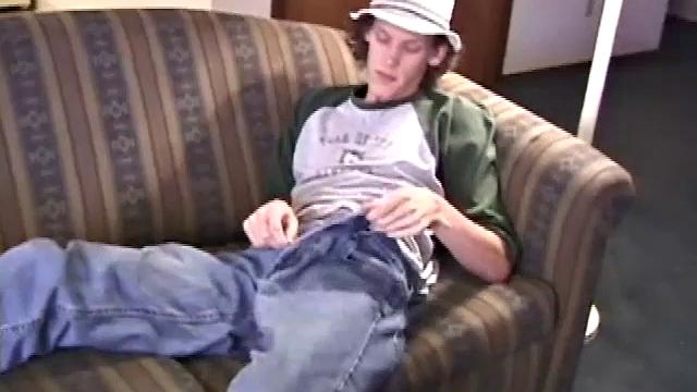 RJ Davis is a 21 year old Texas native, who wants to show the world his unique talents. Naked on the couch, he starts to rub his cock and then makes use of a purple vibrator, which he clearly enjoys.