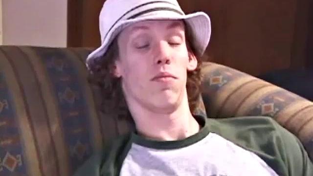 RJ Davis is a 21 year old Texas native, who wants to show the world his unique talents. Naked on the couch, he starts to rub his cock and then makes use of a purple vibrator, which he clearly enjoys.