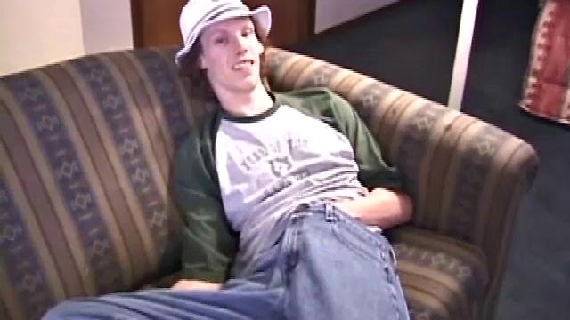 RJ Davis is a 21 year old Texas native, who wants to show the world his unique talents. Naked on the couch, he starts to rub his cock and then makes use of a purple vibrator, which he clearly enjoys.