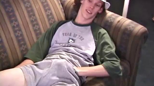 RJ Davis is a 21 year old Texas native, who wants to show the world his unique talents. Naked on the couch, he starts to rub his cock and then makes use of a purple vibrator, which he clearly enjoys.