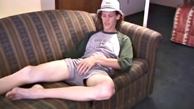 RJ Davis is a 21 year old Texas native, who wants to show the world his unique talents. Naked on the couch, he starts to rub his cock and then makes use of a purple vibrator, which he clearly enjoys.