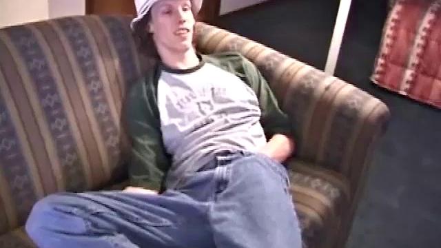 RJ Davis is a 21 year old Texas native, who wants to show the world his unique talents. Naked on the couch, he starts to rub his cock and then makes use of a purple vibrator, which he clearly enjoys.