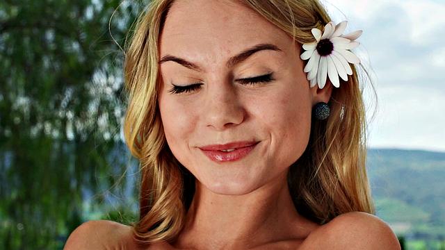 Watch Nancy, the naughty chick, tease her trimmed pussy in public with a thong