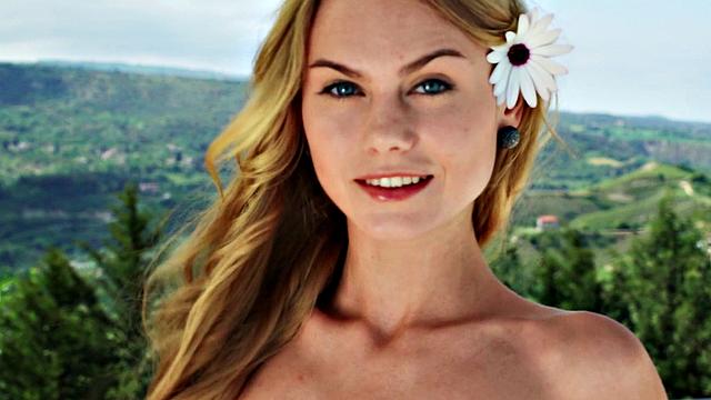 Watch Nancy, the naughty chick, tease her trimmed pussy in public with a thong