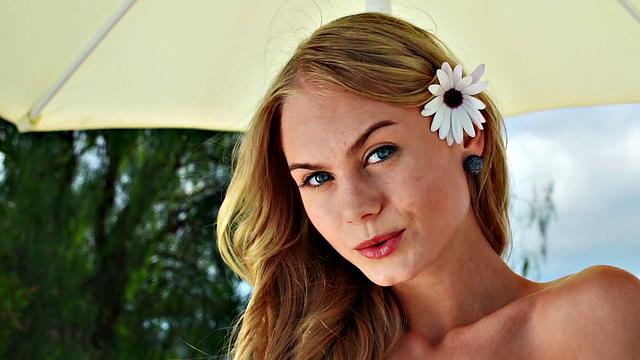 Watch Nancy, the naughty chick, tease her trimmed pussy in public with a thong