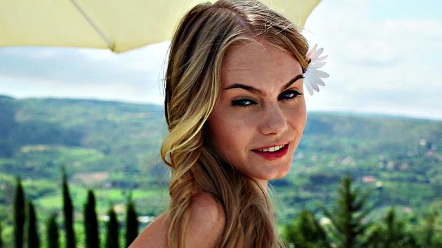 Watch Nancy, the naughty chick, tease her trimmed pussy in public with a thong