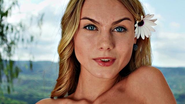 Watch Nancy, the naughty chick, tease her trimmed pussy in public with a thong