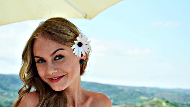 Watch Nancy, the naughty chick, tease her trimmed pussy in public with a thong