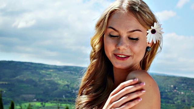 Watch Nancy, the naughty chick, tease her trimmed pussy in public with a thong