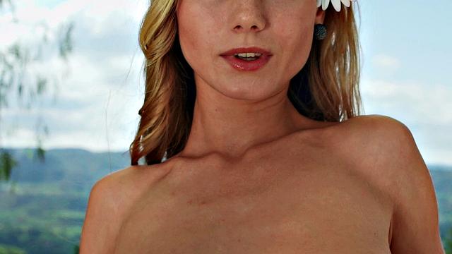 Watch Nancy, the naughty chick, tease her trimmed pussy in public with a thong