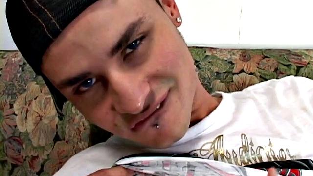 Omar is a skinny Latin with the need to get off. Parked on the sofa, he slowly strips out of his clothes. By the time he's naked that uncut cock of his is rock hard.