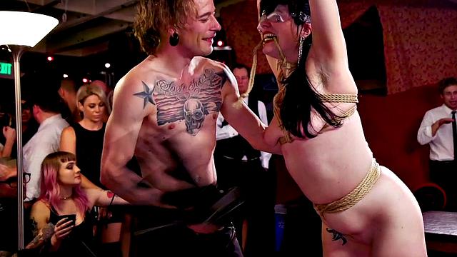 BDSM public ladies tied up and whipped on floor