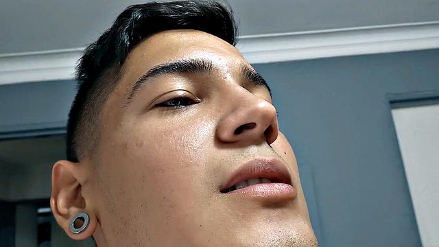 El Diablo strips naked and gives us a good look at his fine little butt, before sitting on the edge of a bed to work up a stiff one. Rock hard, the young Latino gets busy jerking off.