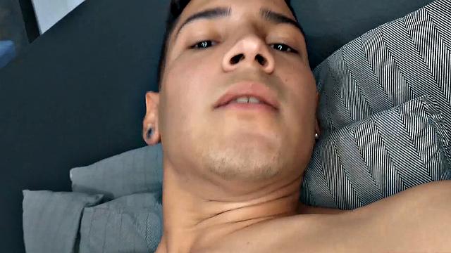 El Diablo strips naked and gives us a good look at his fine little butt, before sitting on the edge of a bed to work up a stiff one. Rock hard, the young Latino gets busy jerking off.