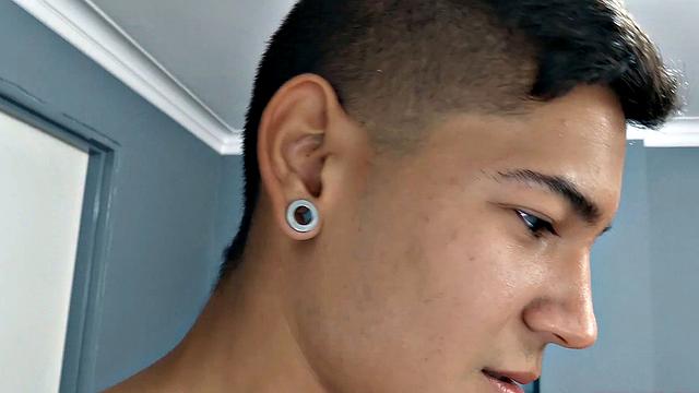 El Diablo strips naked and gives us a good look at his fine little butt, before sitting on the edge of a bed to work up a stiff one. Rock hard, the young Latino gets busy jerking off.