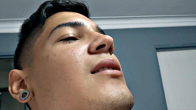 El Diablo strips naked and gives us a good look at his fine little butt, before sitting on the edge of a bed to work up a stiff one. Rock hard, the young Latino gets busy jerking off.