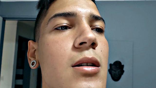 El Diablo strips naked and gives us a good look at his fine little butt, before sitting on the edge of a bed to work up a stiff one. Rock hard, the young Latino gets busy jerking off.