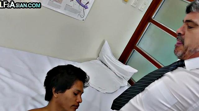 Mature doctor barebacks Asian twink on medical check