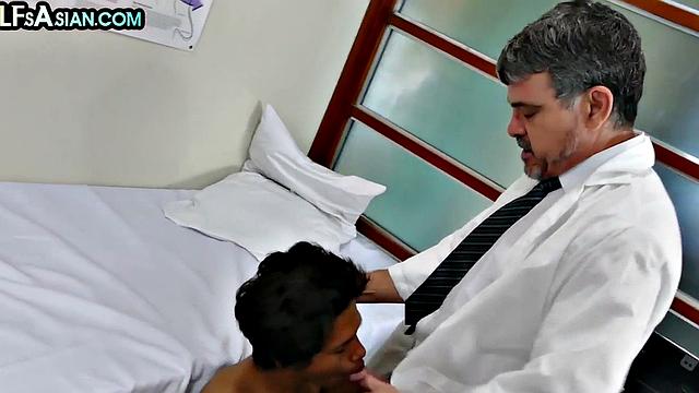 Mature doctor barebacks Asian twink on medical check