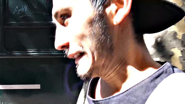 Three horny men hook up outdoors while a stranger joins and fills his mouth and ass with cock