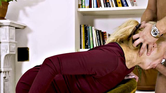 Hot blonde maid and guy get naughty by the fireplace in stockings and high heels