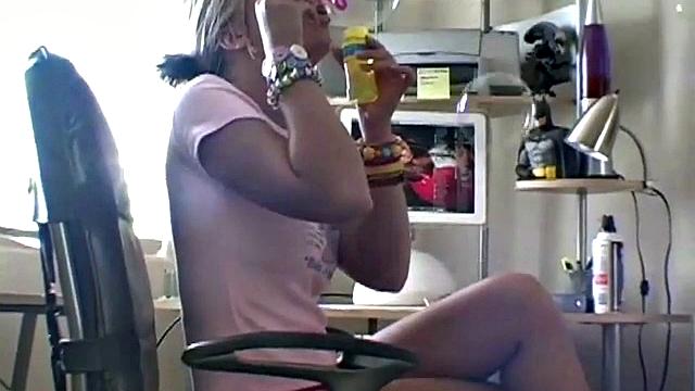 Kelli Tease on Chair and Computer