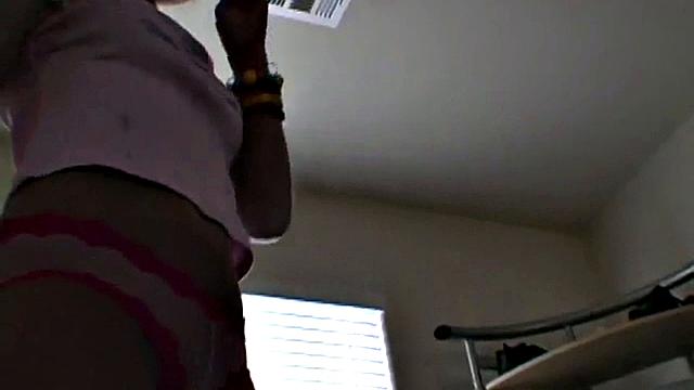 Kelli Tease on Chair and Computer