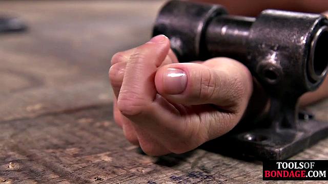 Big-titted tied babe learns discipline