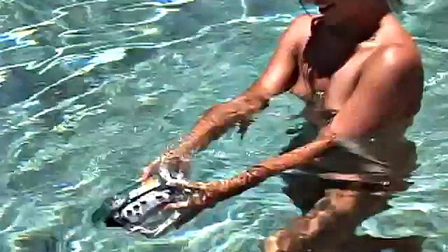 Babe on lilo in the sun