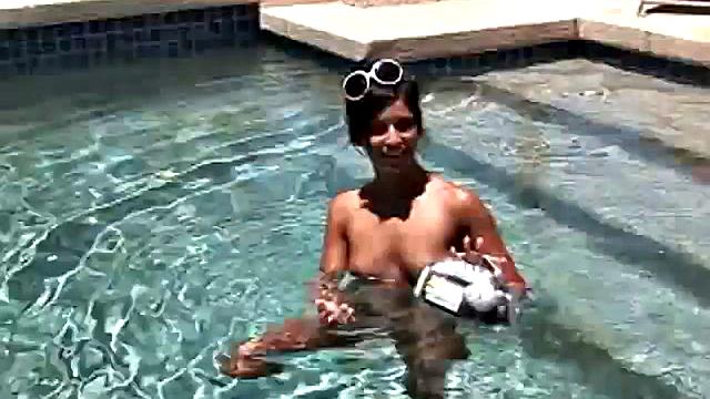 Babe on lilo in the sun