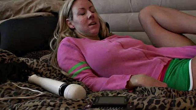 Busty babe toying her wet pussy with vibrator