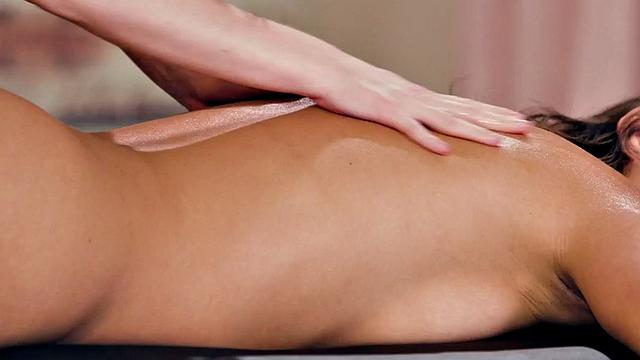 Massaging busty babe seduces bigass dyke after oiled session