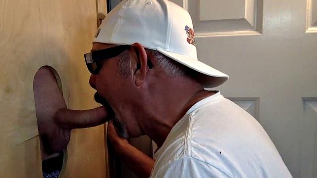 Gloryhole DILF sucks and wanks shaved rod before sex