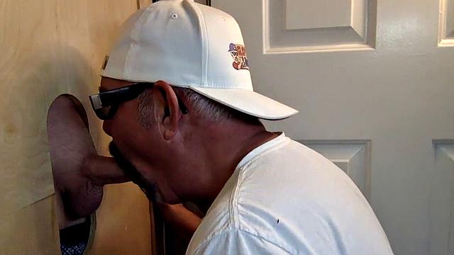 Gloryhole DILF sucks and wanks shaved rod before sex