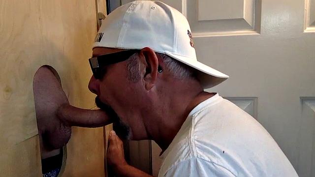Gloryhole DILF sucks and wanks shaved rod before sex