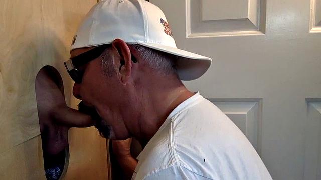 Gloryhole DILF sucks and wanks shaved rod before sex