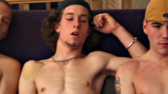 Stephen and Timmy watch porn as Adam joins them. All three naked, stroking cocks. Stephen's lips around Adam's dick.