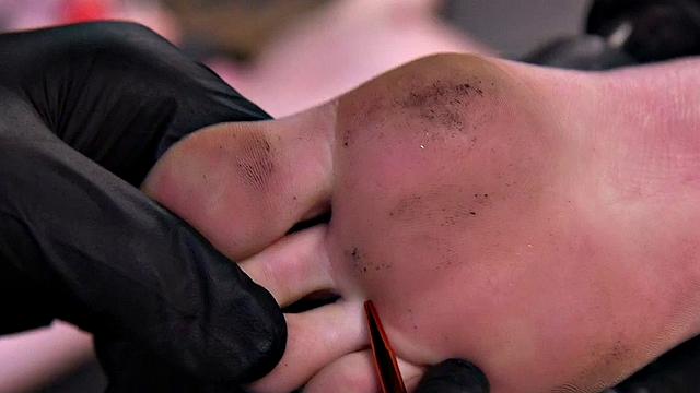 BDSM ballgagged submissive whipped over body and feet