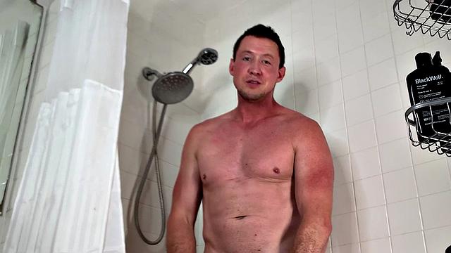 Muscled jock solo jerking while showering
