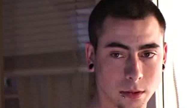 Luke Daniels jerks off in the garage. He works the length of his cock, and edges himself, until he pops a big wet one onto the floor