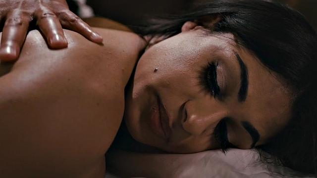 Busty trans beauty sucking masseur before riding cock