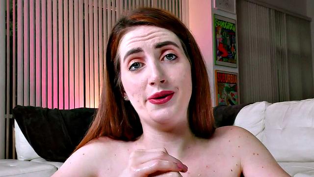 HJ redhead domina gives teasing oiled handjob in POV