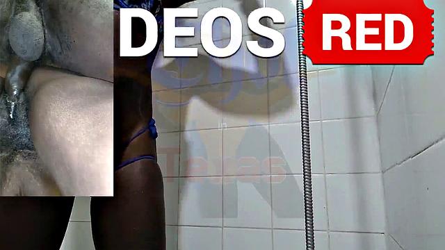 A American MILF get down and dirty in the shower with her black friend