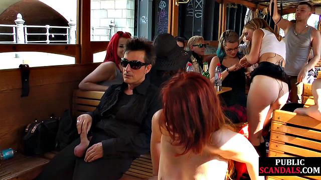 Redhead cougar cockriding on boat