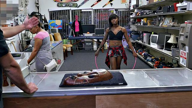 A tattooed ebony babe get her pussy pounded in a pawnshop while wearing a bra and a top