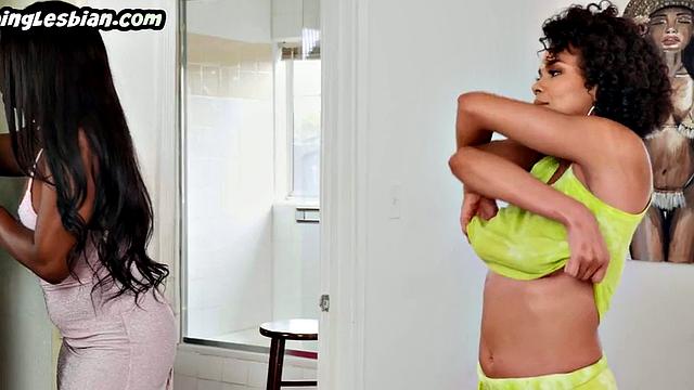 Busty ebony babe scissoring her GF after facesitting