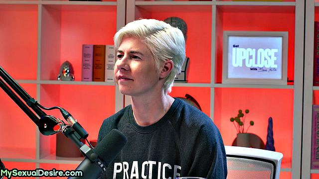 Naughty big-titted MILF solo